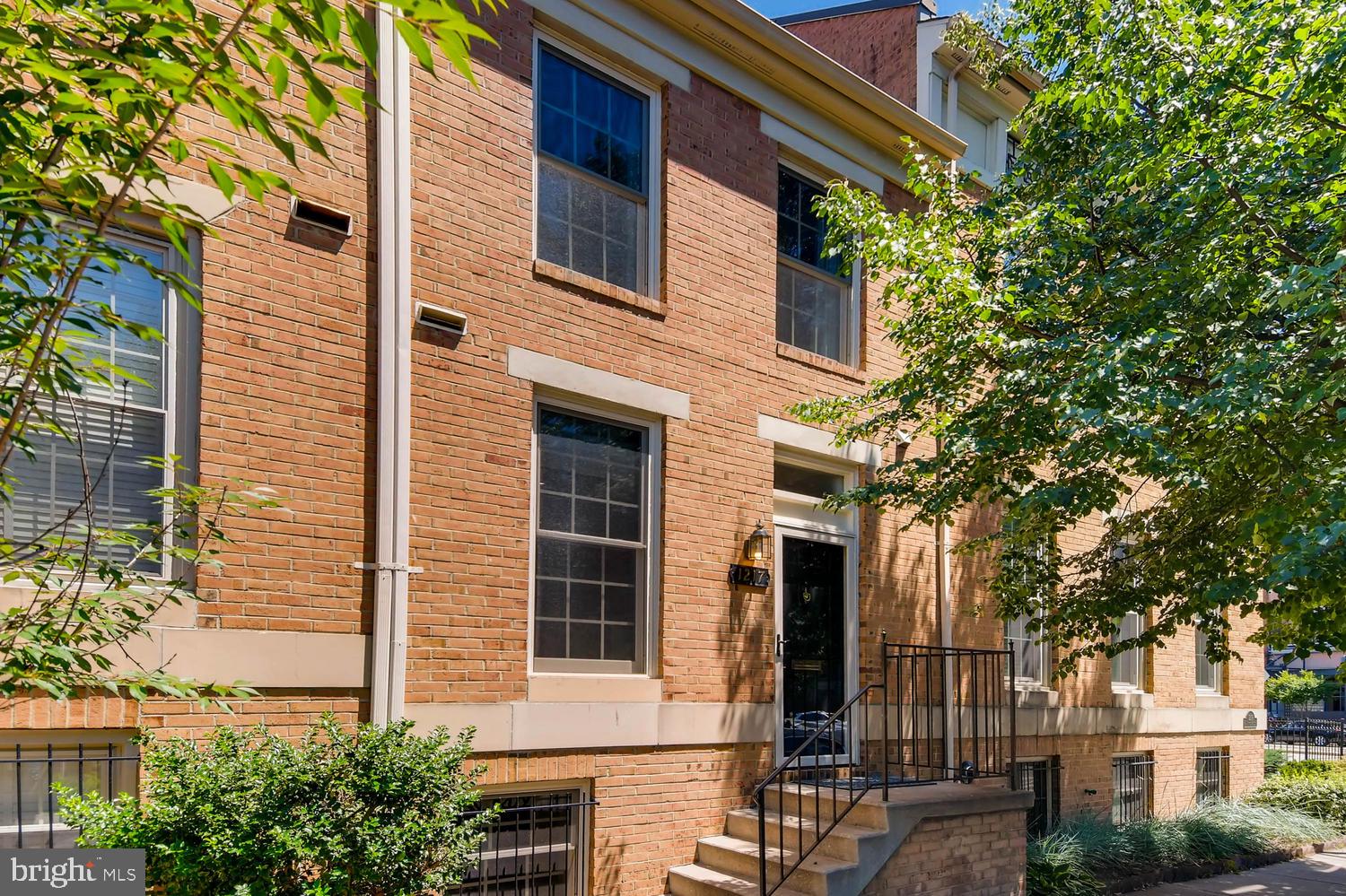 a view of a building with a tree