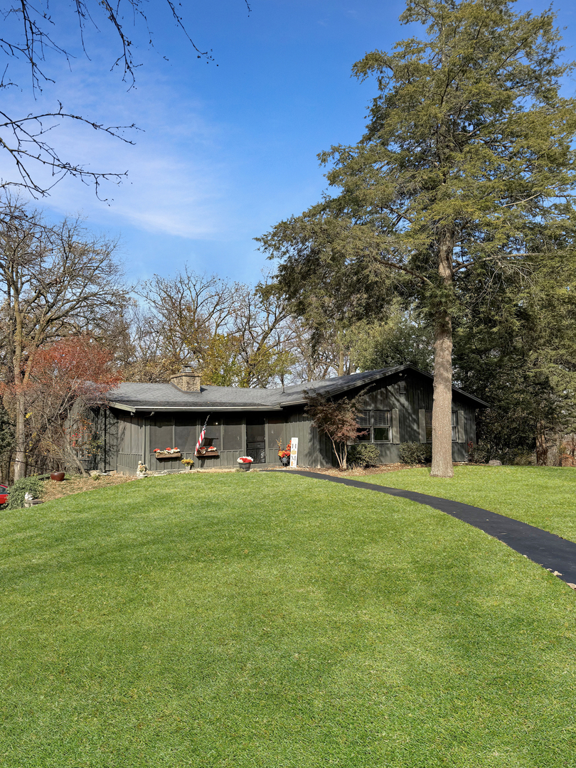 a view of a house with a big yard