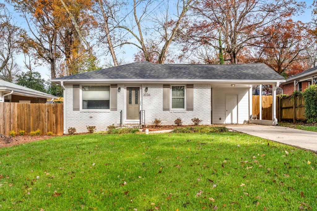 front view of a house with a yard