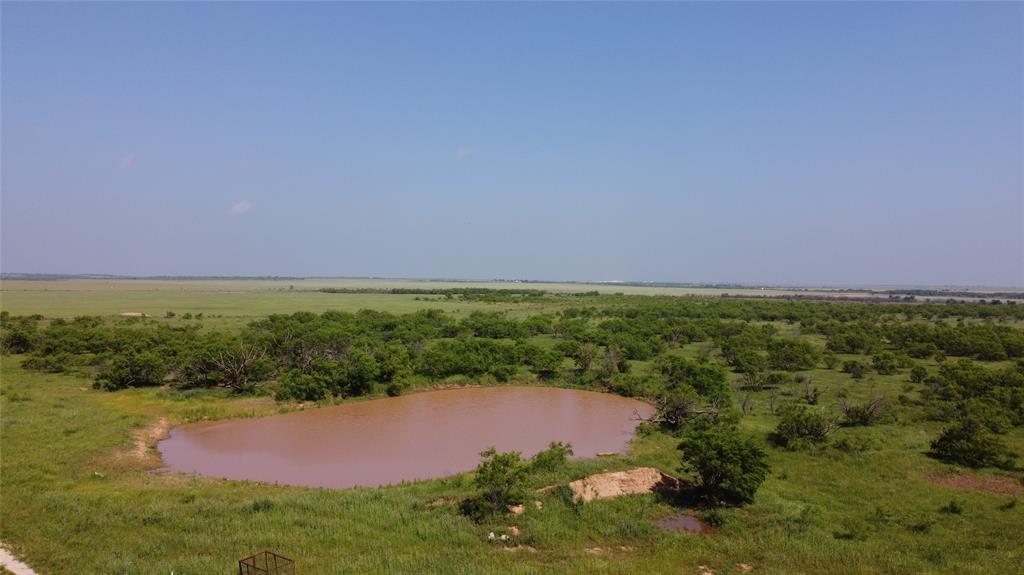 a view of lake with mountain in background