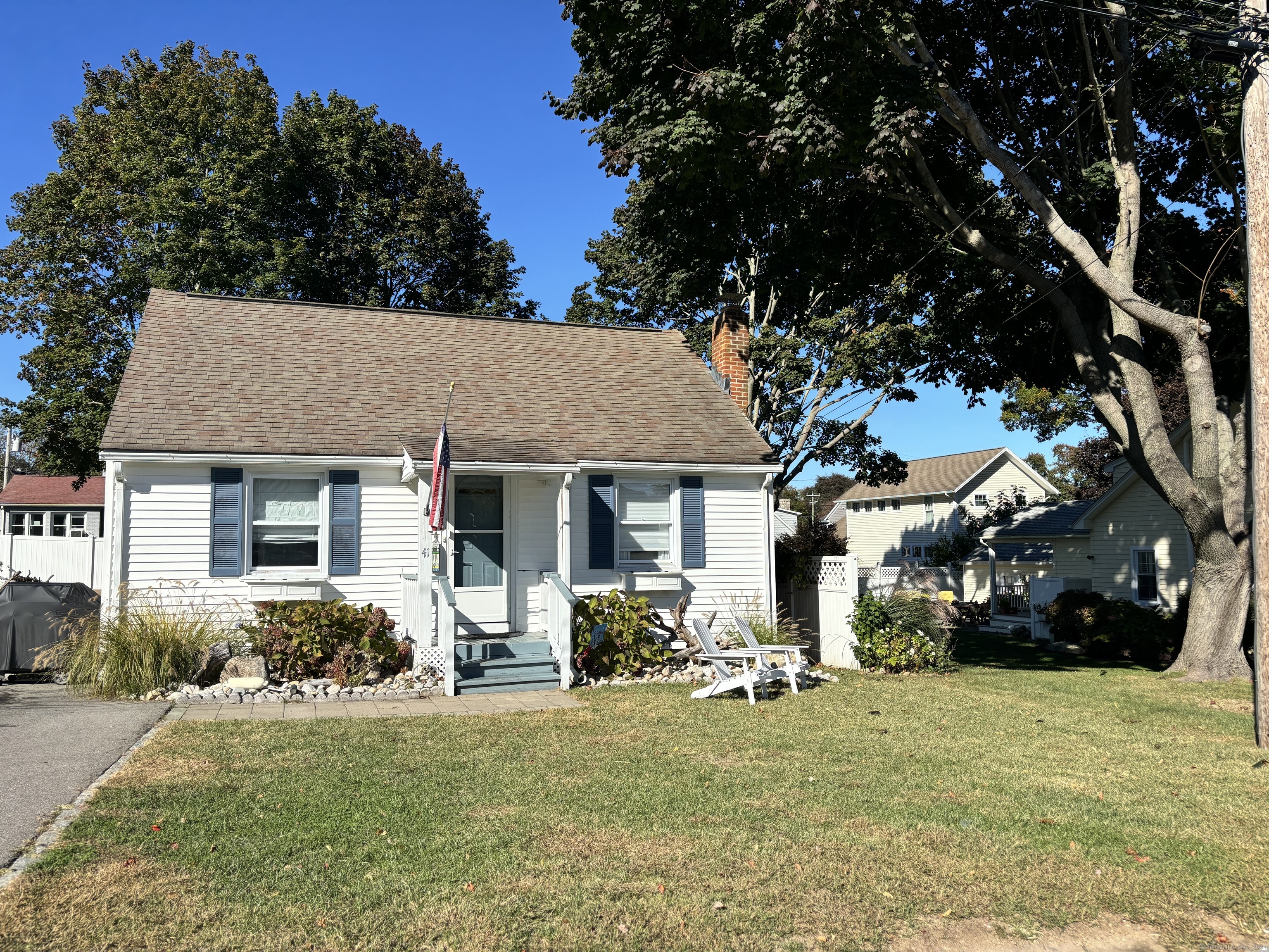 front view of a house with a yard