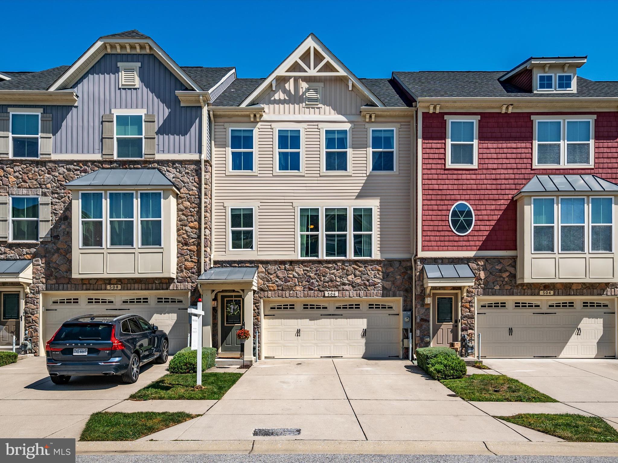 STUNNING 3 story townhome at Creekside Village!