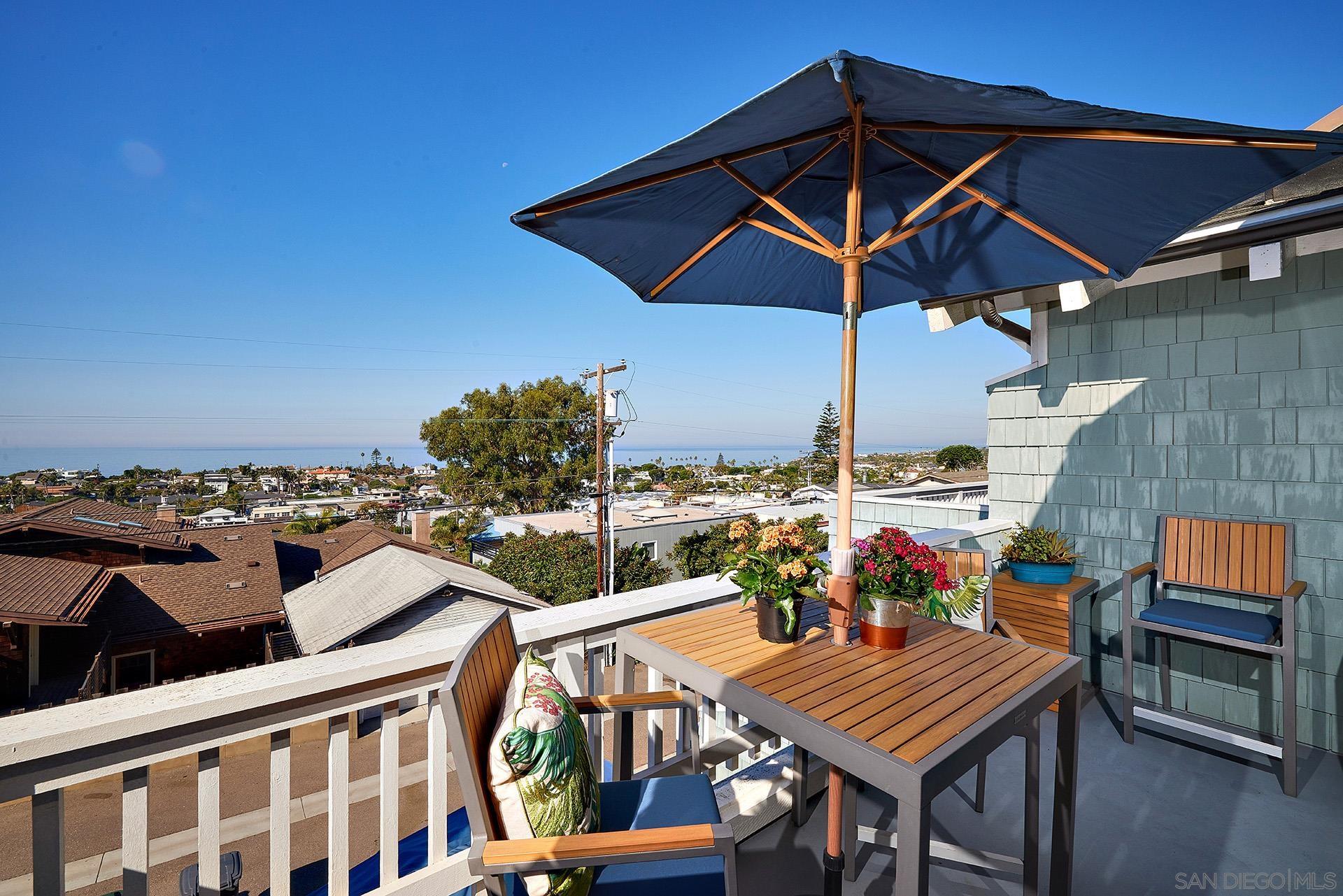 a view of a terrace with sitting area