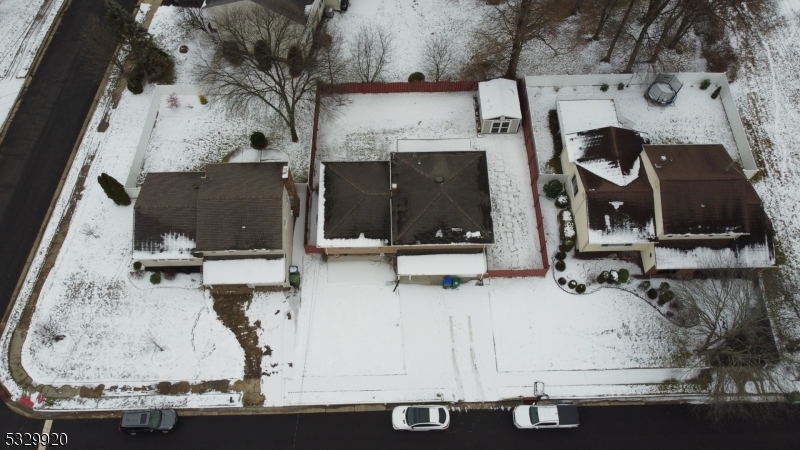 an aerial view of a fireplace with sitting area