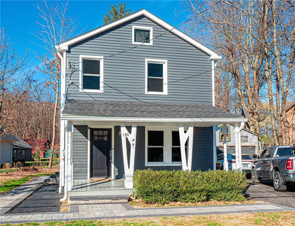 View of front of house with covered porch