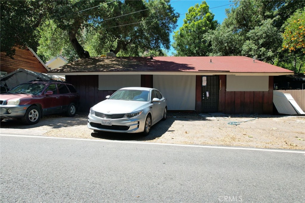 a car parked in front of a house