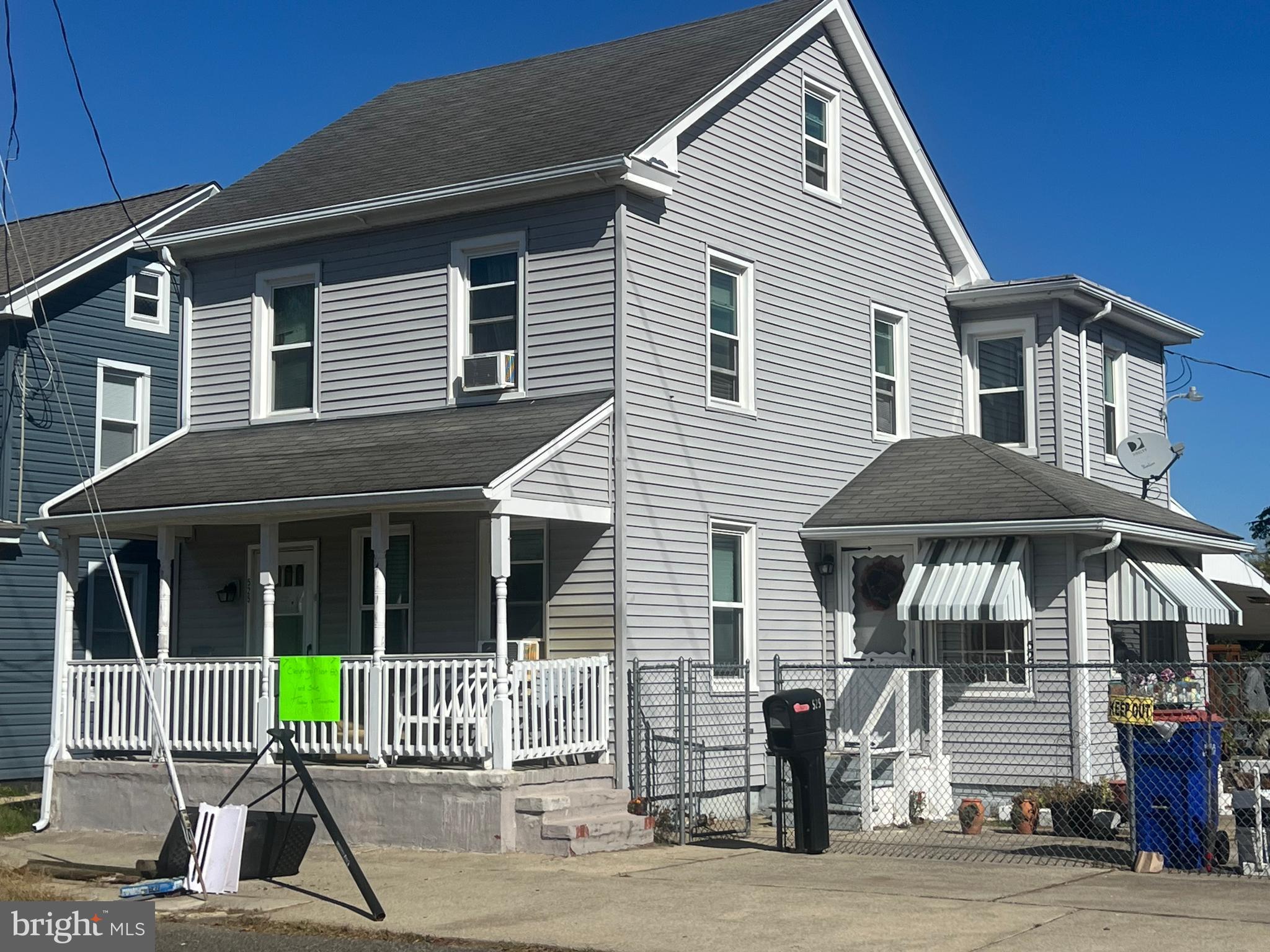 a front view of a house with porch