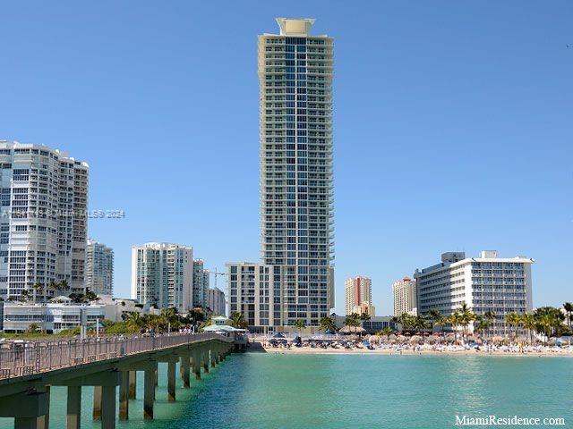 a view of a city with tall buildings