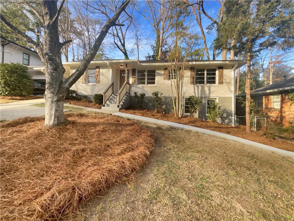 front view of a house with a yard