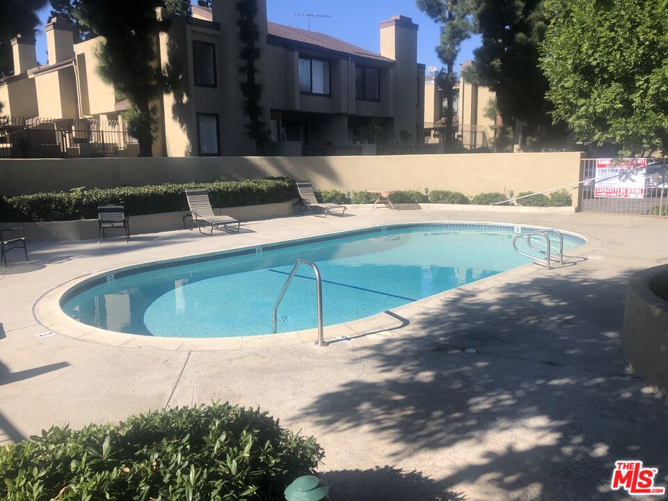 a view of a back yard of the house