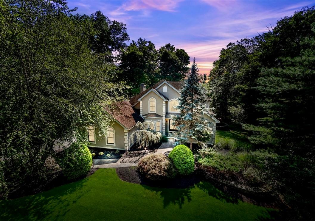 a house view with a garden space