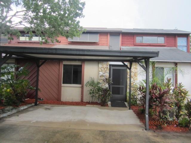 a house with trees in front of it