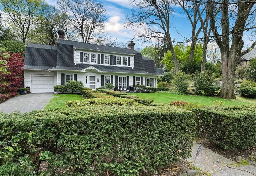 a view of a house with a garden