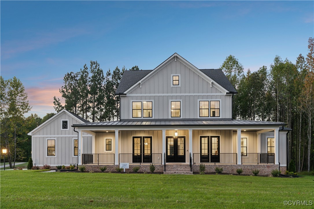 front view of a house with a yard