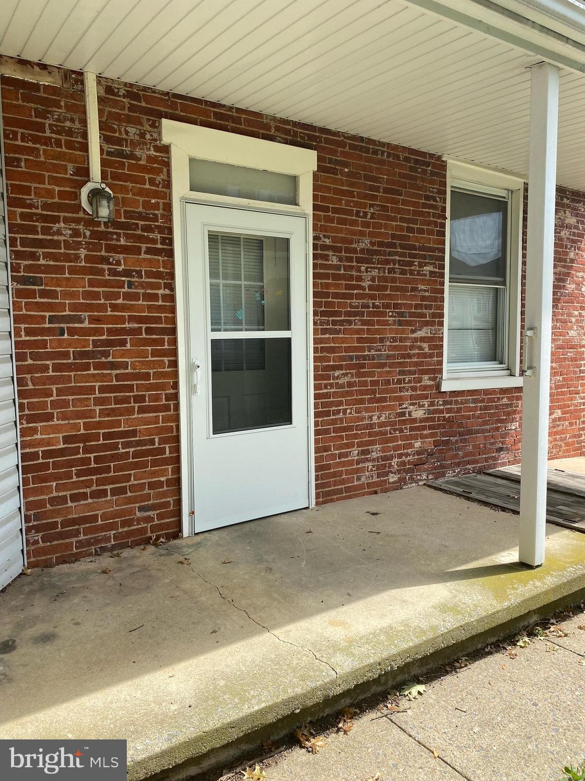 a view of entrance gate of a house