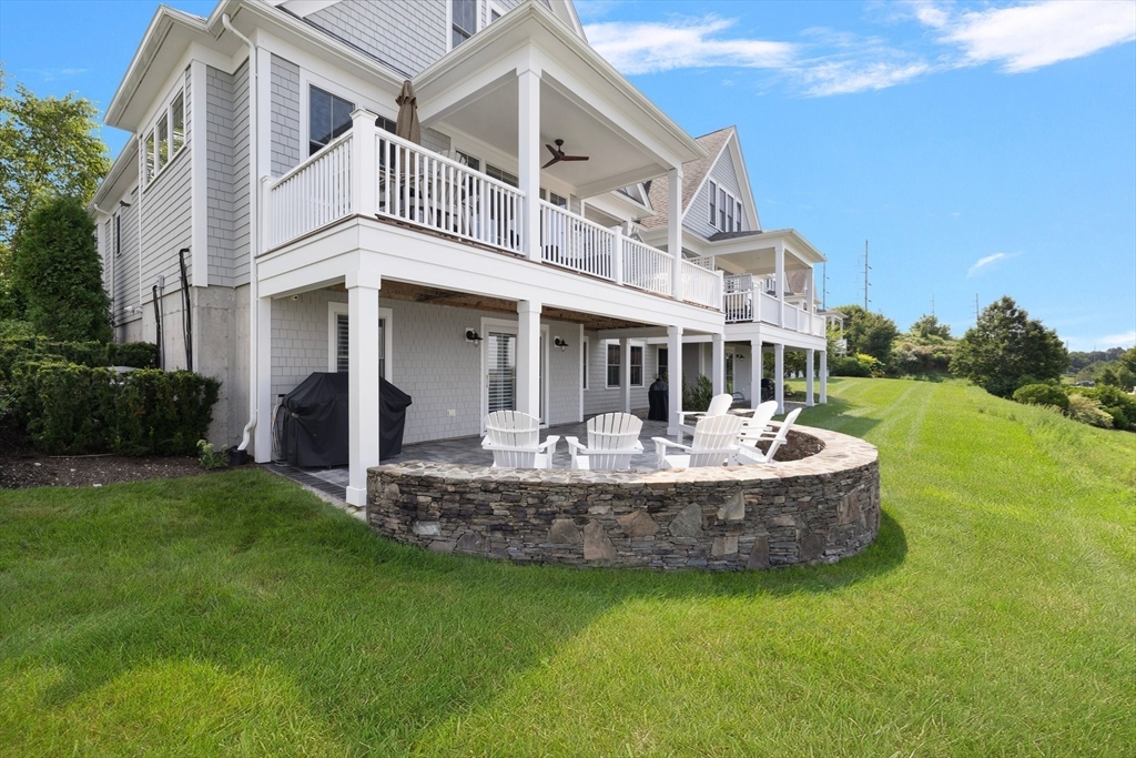 a front view of a house with a garden and porch