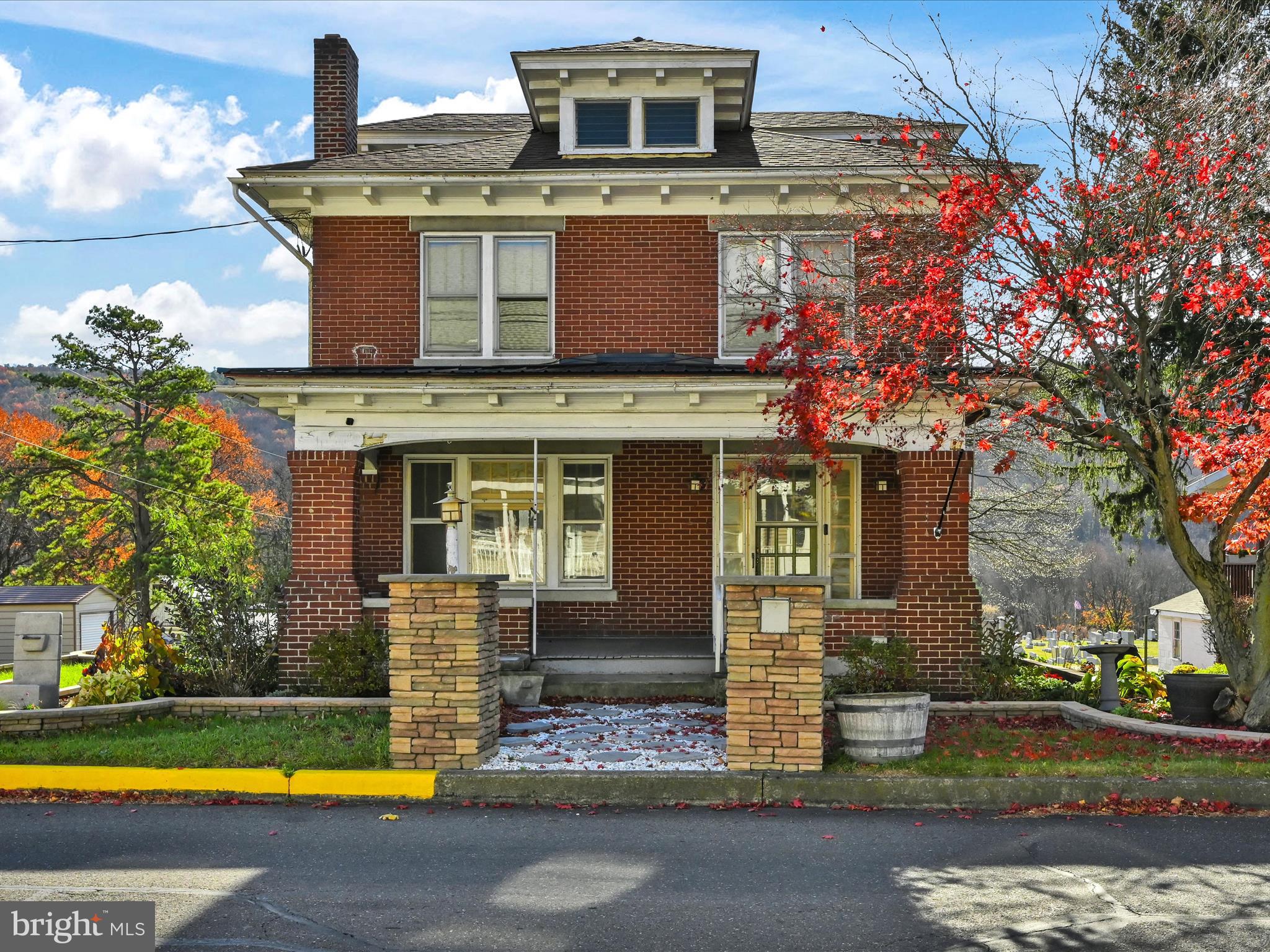 a front view of a house with swimming pool