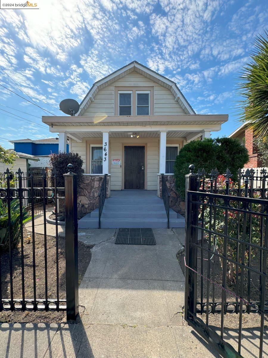 a front view of a house with yard