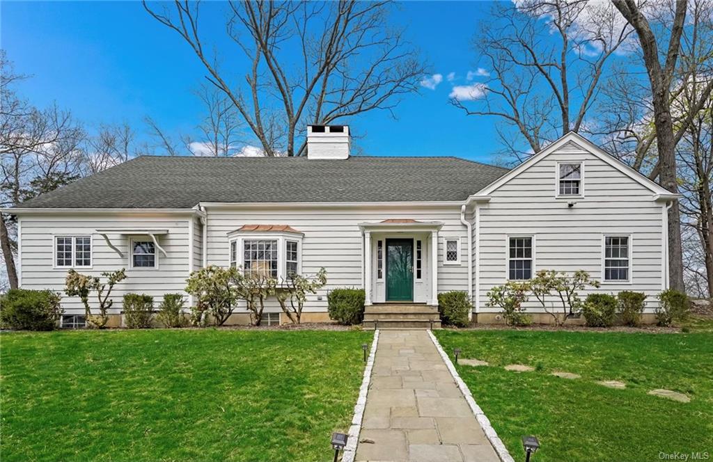 a front view of house with yard