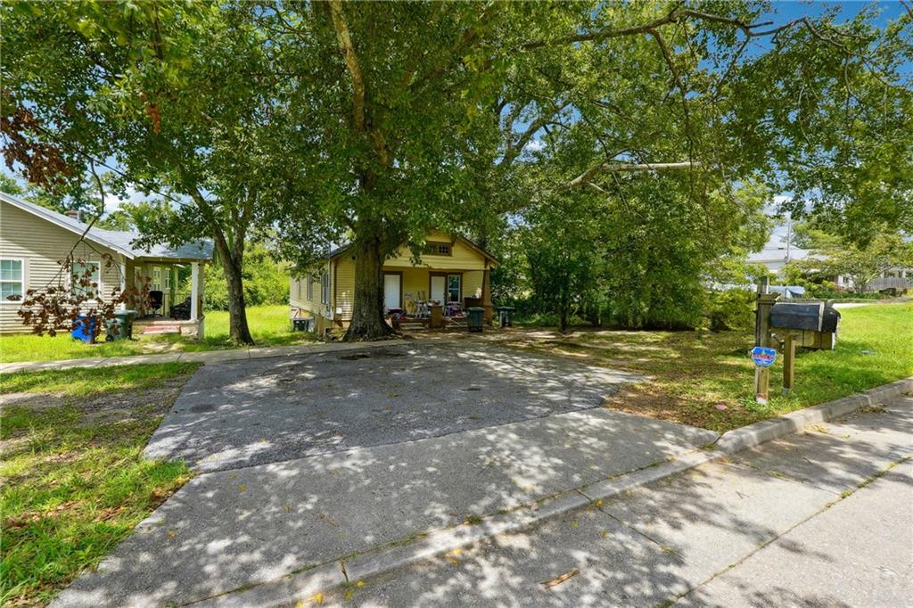 a view of house with outdoor space