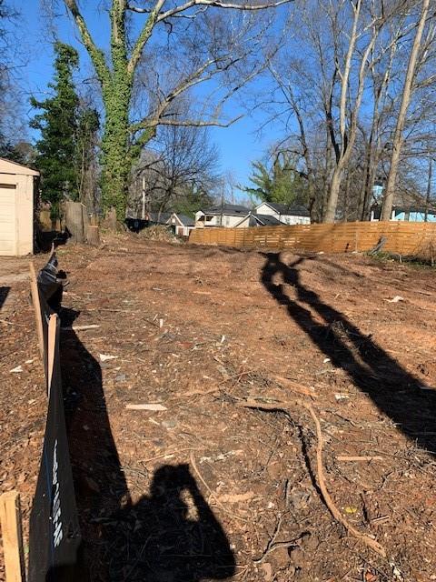 a view of a backyard of the house