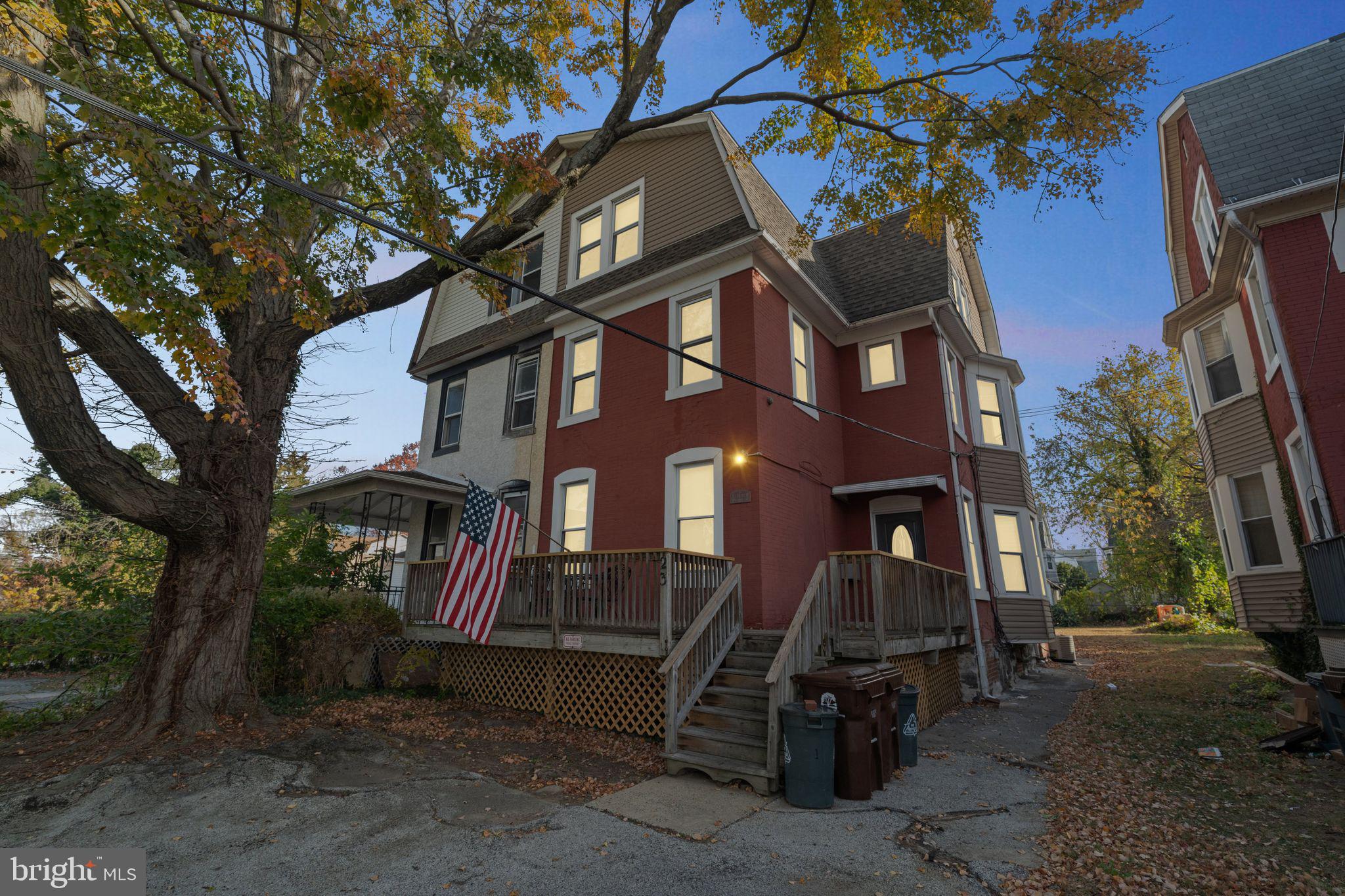 a view of a building with a yard