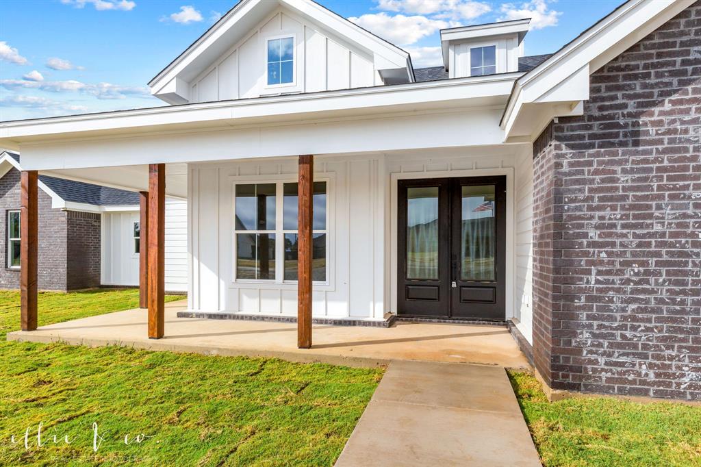 a front view of a house with a porch