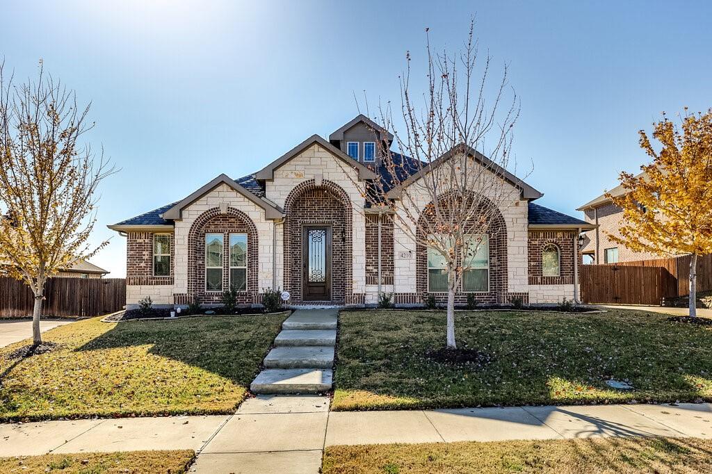 View of front of home with a front yard