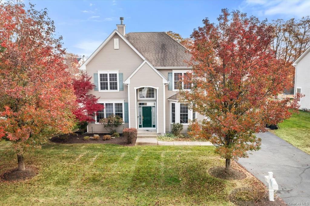 View of front of home featuring a front yard