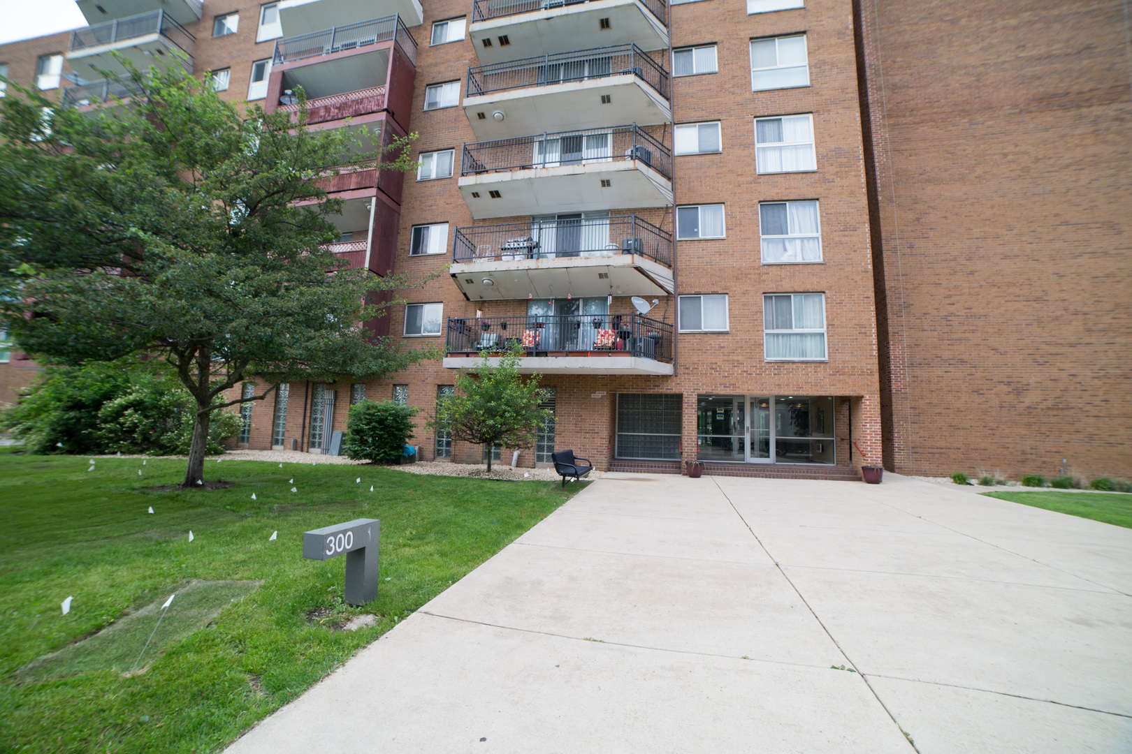 a front view of building with yard