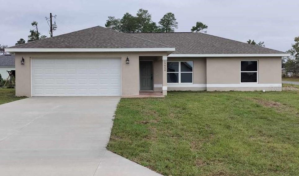 front view of a house with a yard