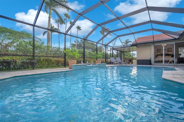 $1,025,000 | 821 Cypress Pointe Drive East | Grand Palms