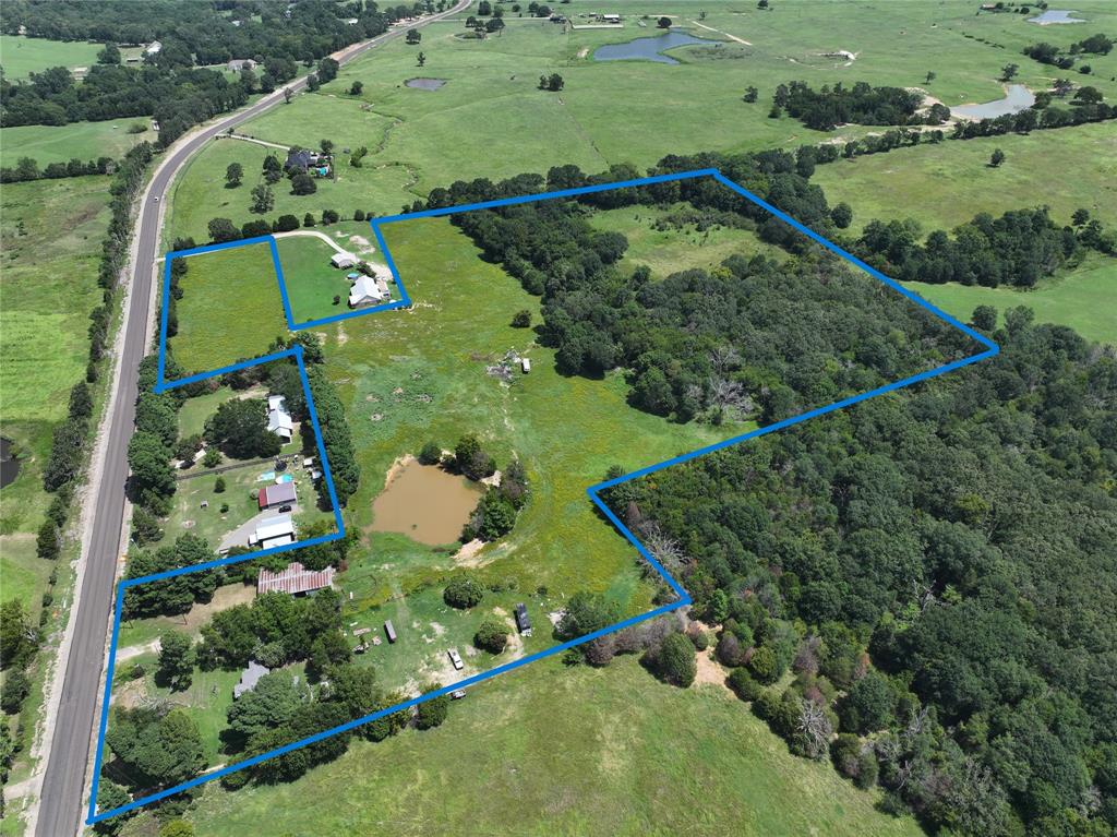 an aerial view of a golf course with a park