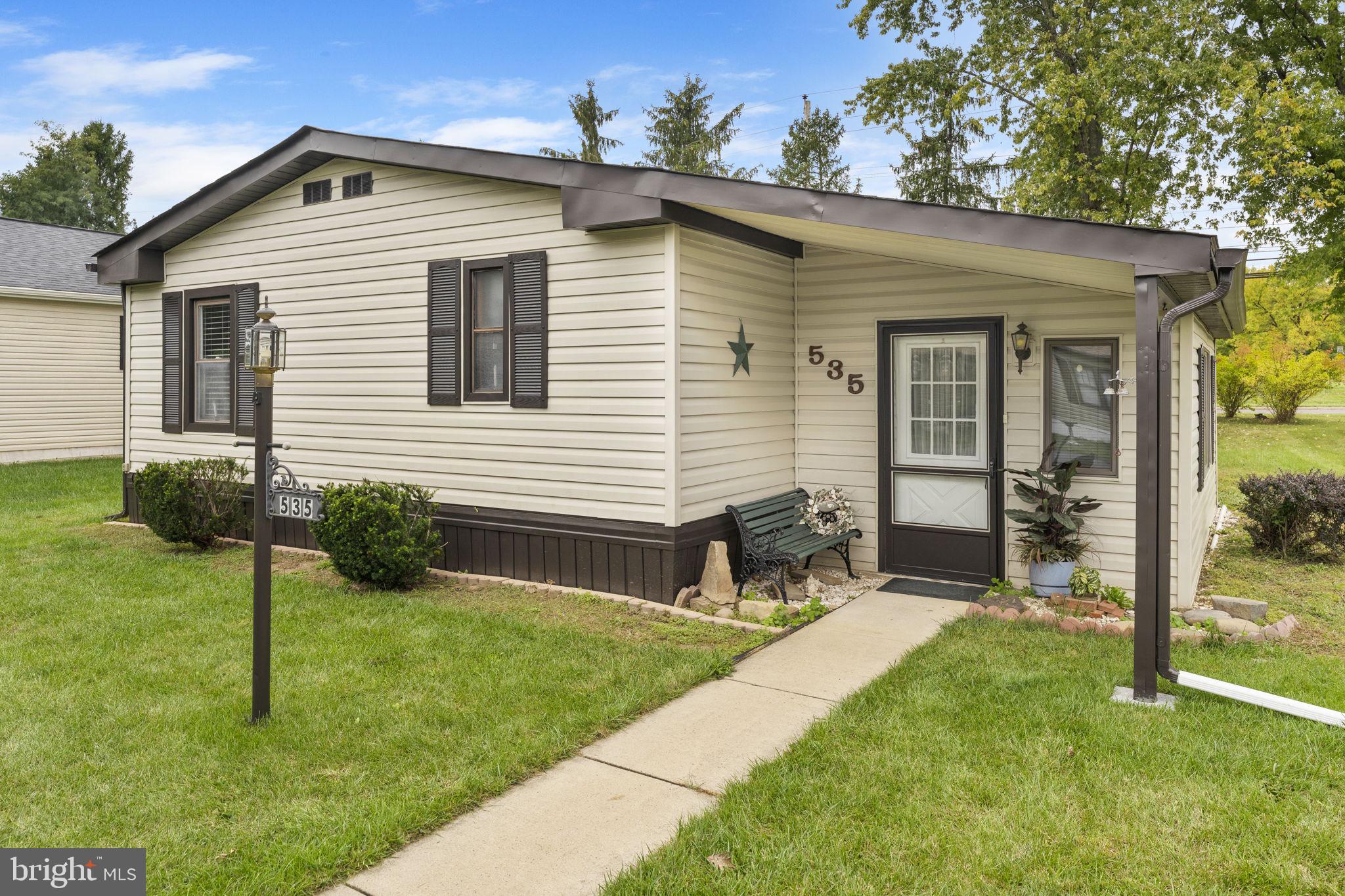 a front view of house with yard