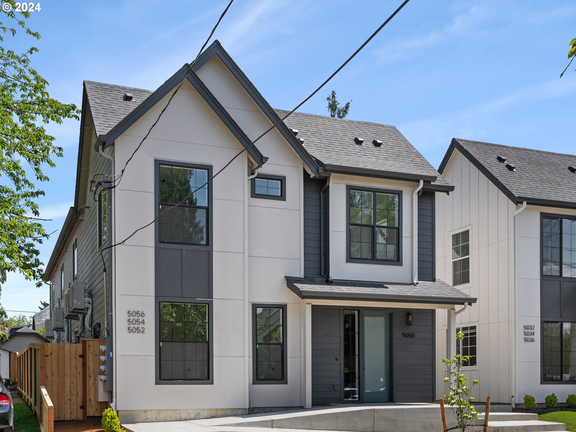 a front view of multi story residential apartment building