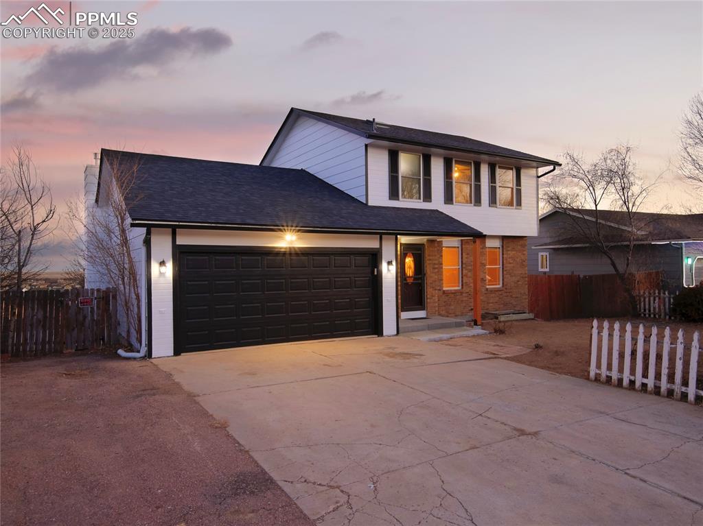 front view of a house with a garage