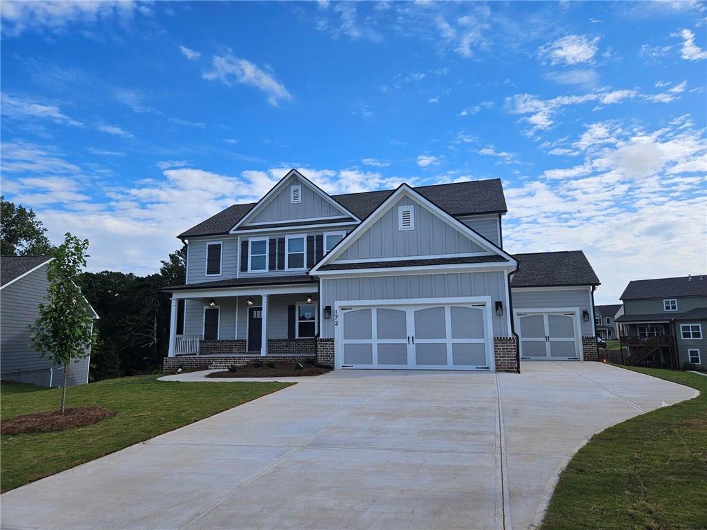 front view of a house with a yard