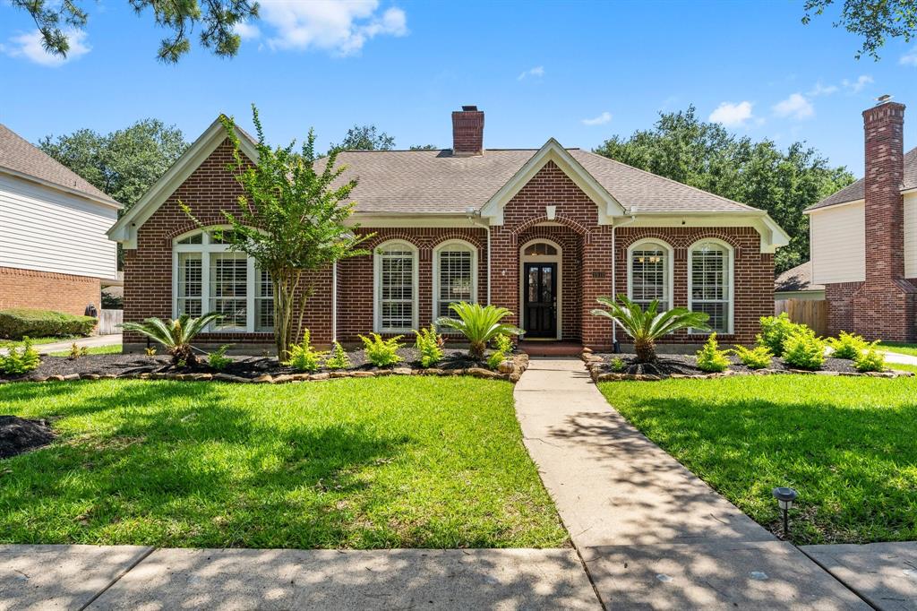 Captivating curb appeal awaits you with this charming house.