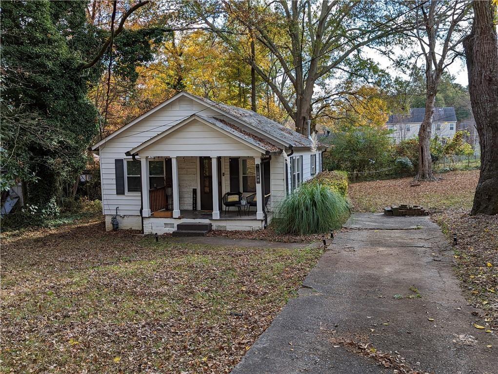 a house with trees in the background