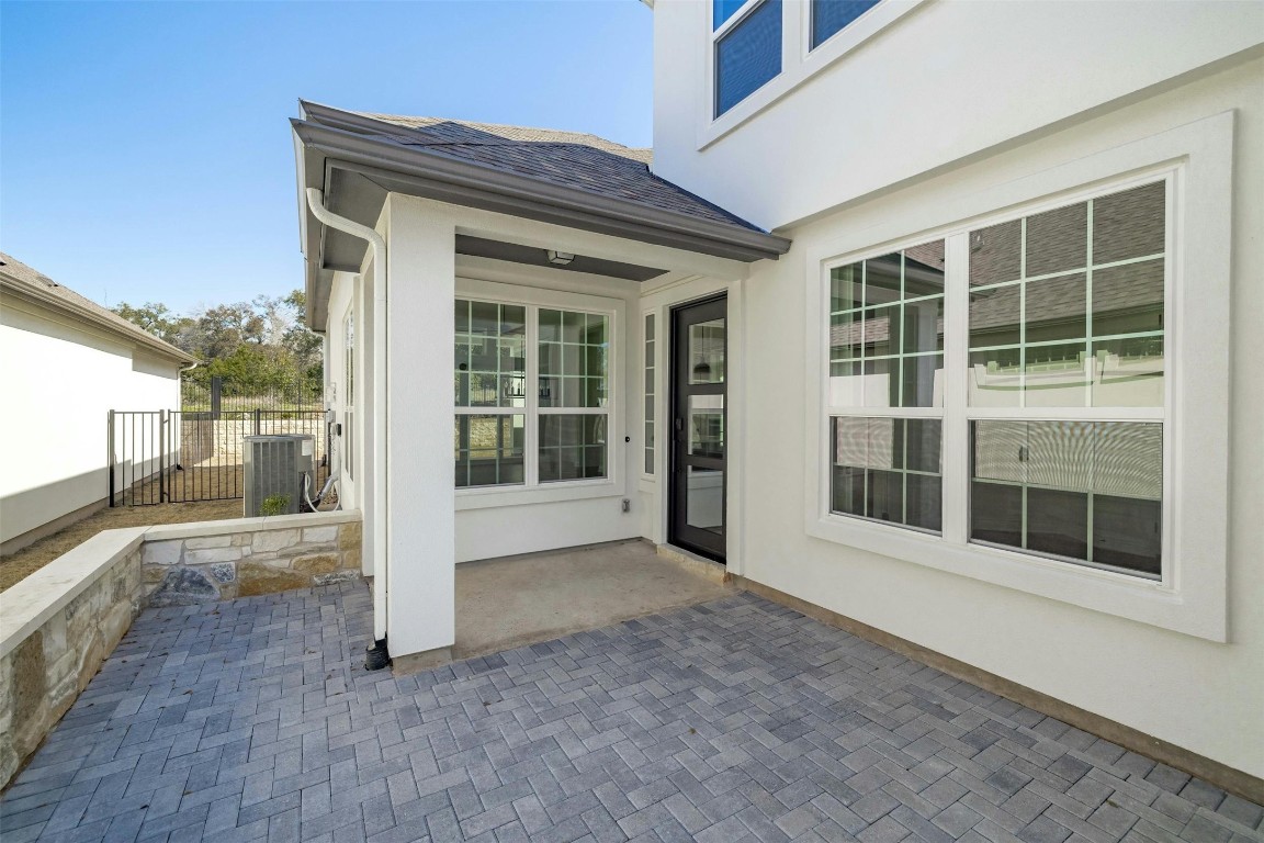 a view of a house with a large window