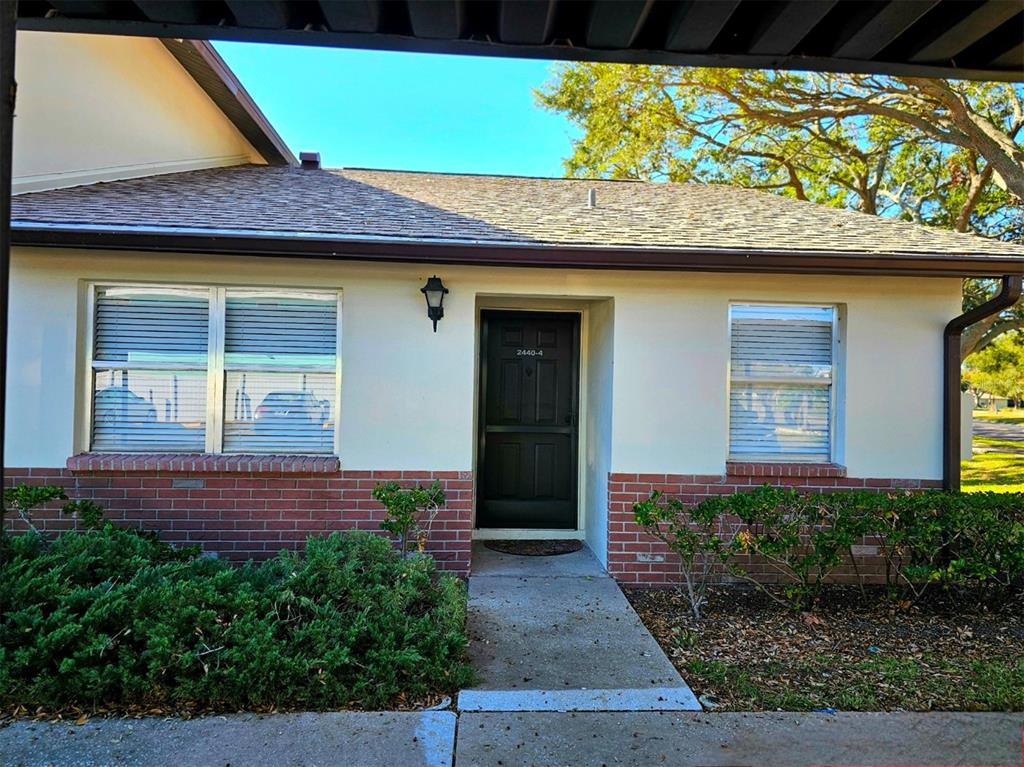 a view of outdoor space and front view of a house