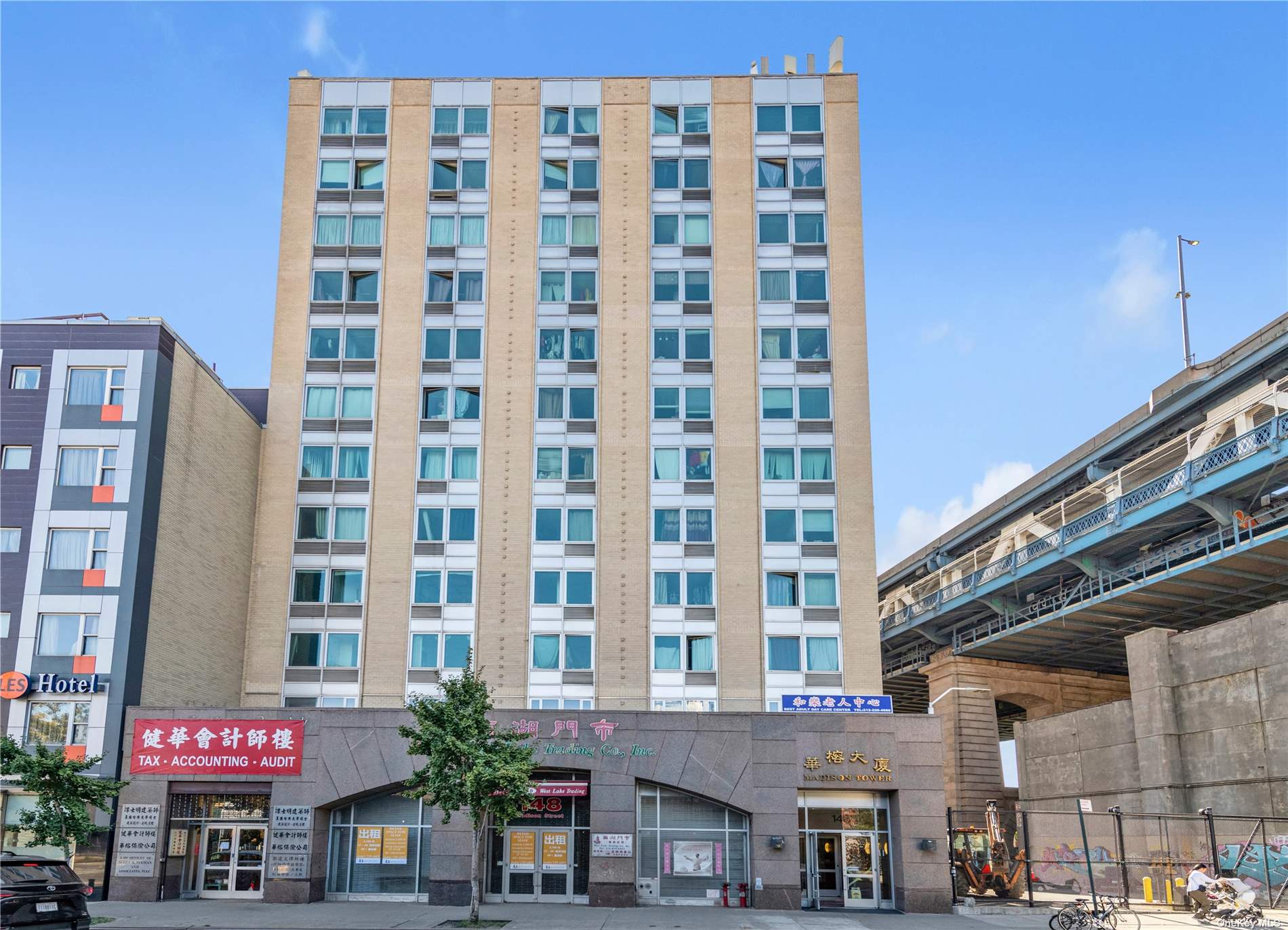 a front view of a building with street