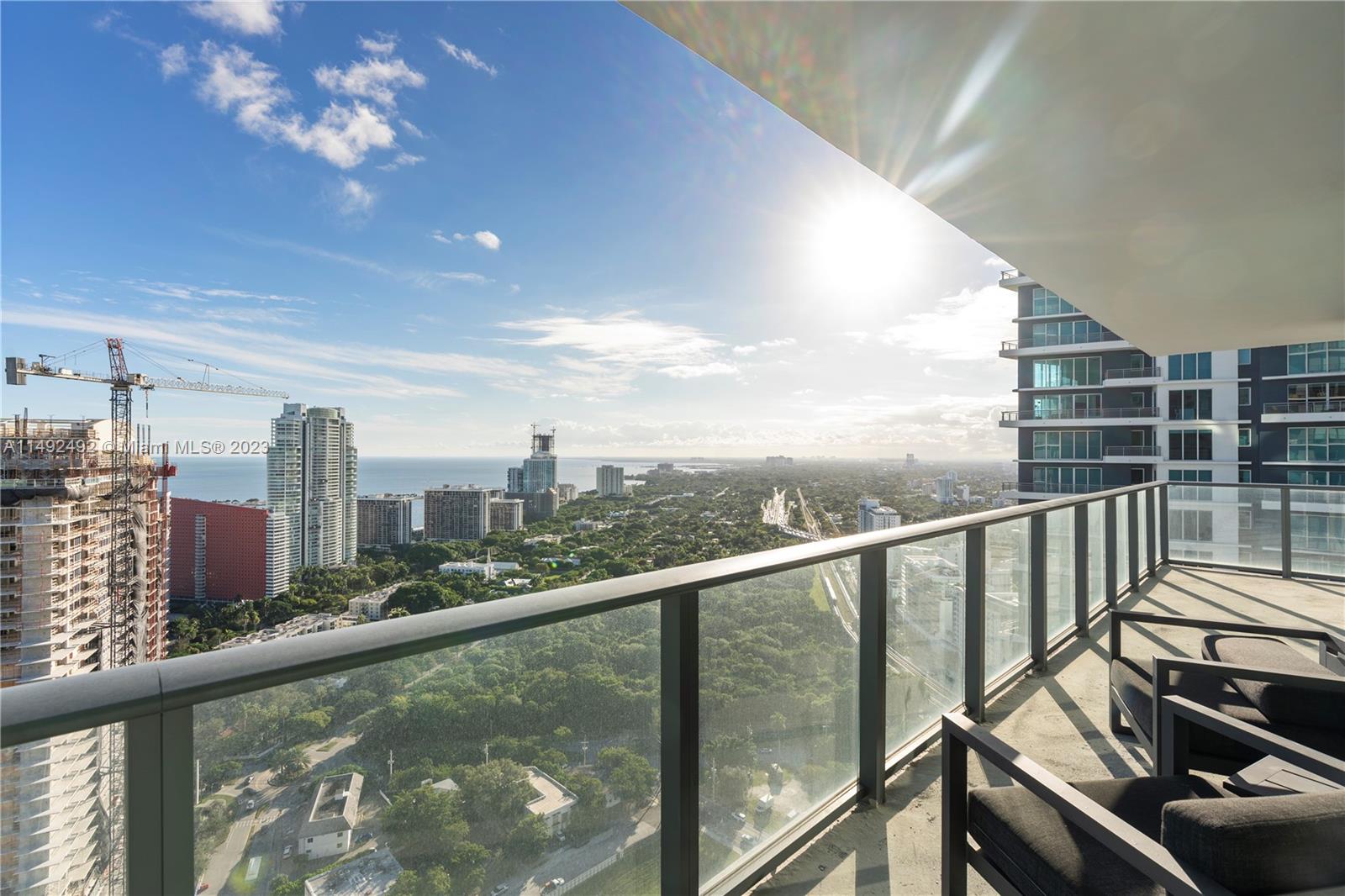 a view of a balcony with city view