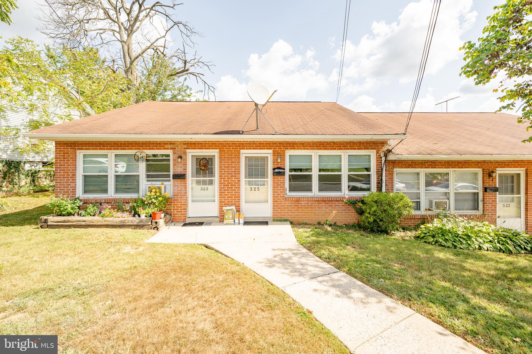 front view of a house with a patio