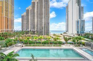 a view of a swimming pool and outdoor space