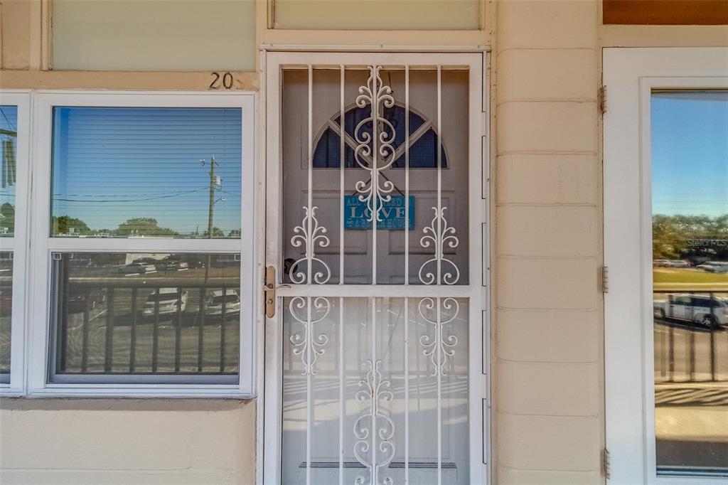 a front view of a house with a glass door