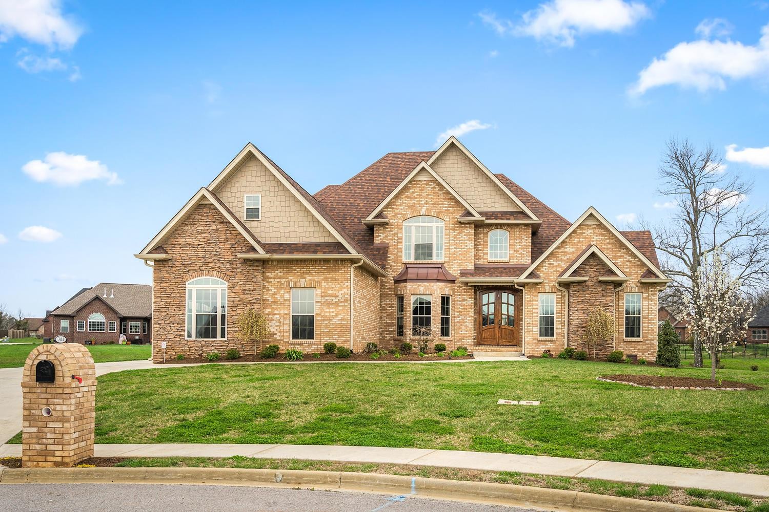 a view of a house with a yard