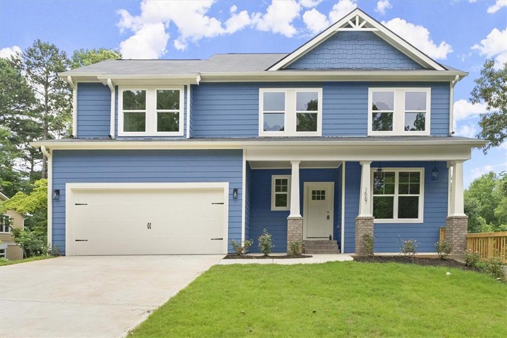 front view of a house with a yard