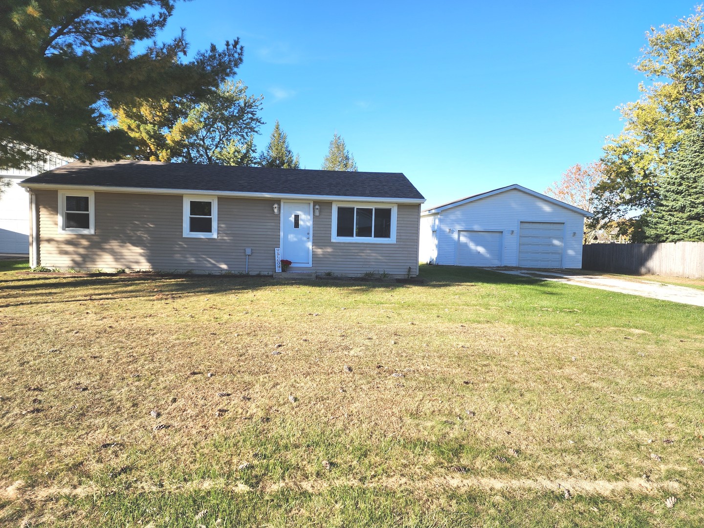 a view of a house with a yard