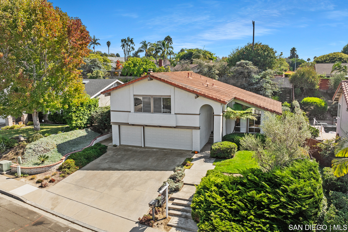 a house view with a garden space